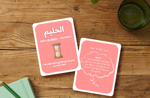 Sakina Cards: Al-Haleem (The Patient) Name of Allah card with hourglass and a parent affirmation card on a wooden table